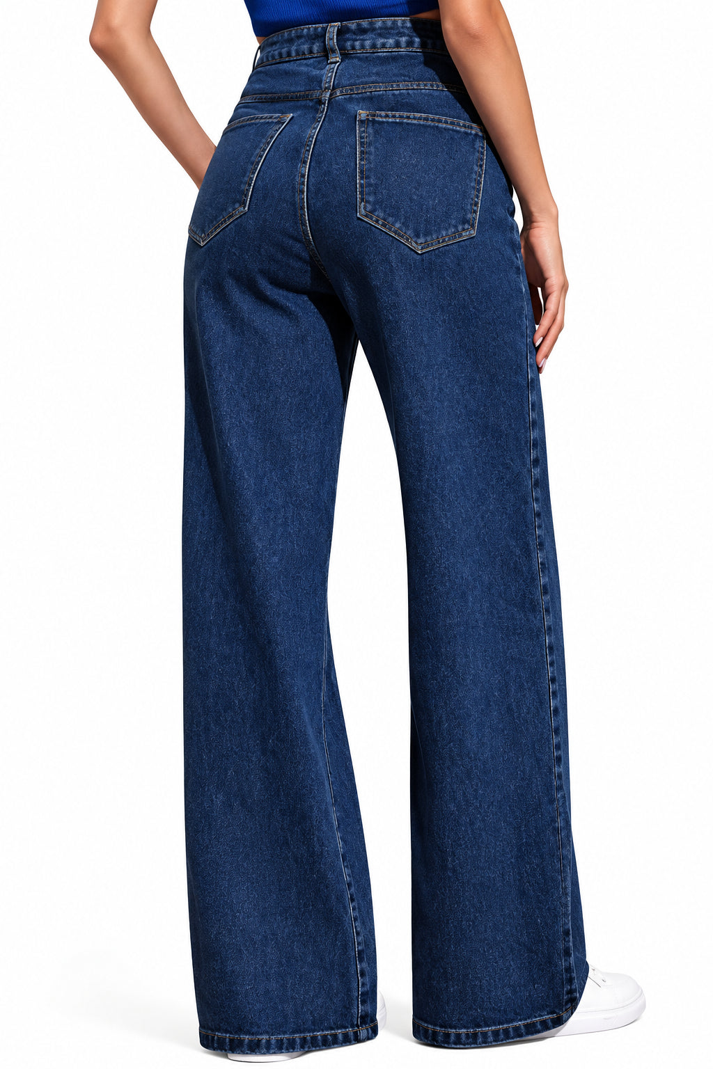 Blue jeans worn by a person on a white background