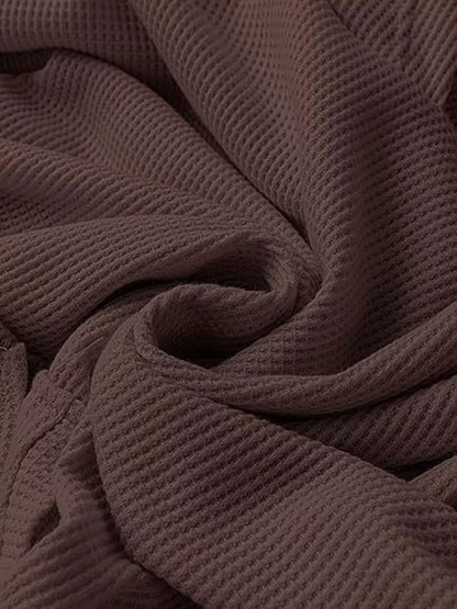 Close-up of brown textured fabric