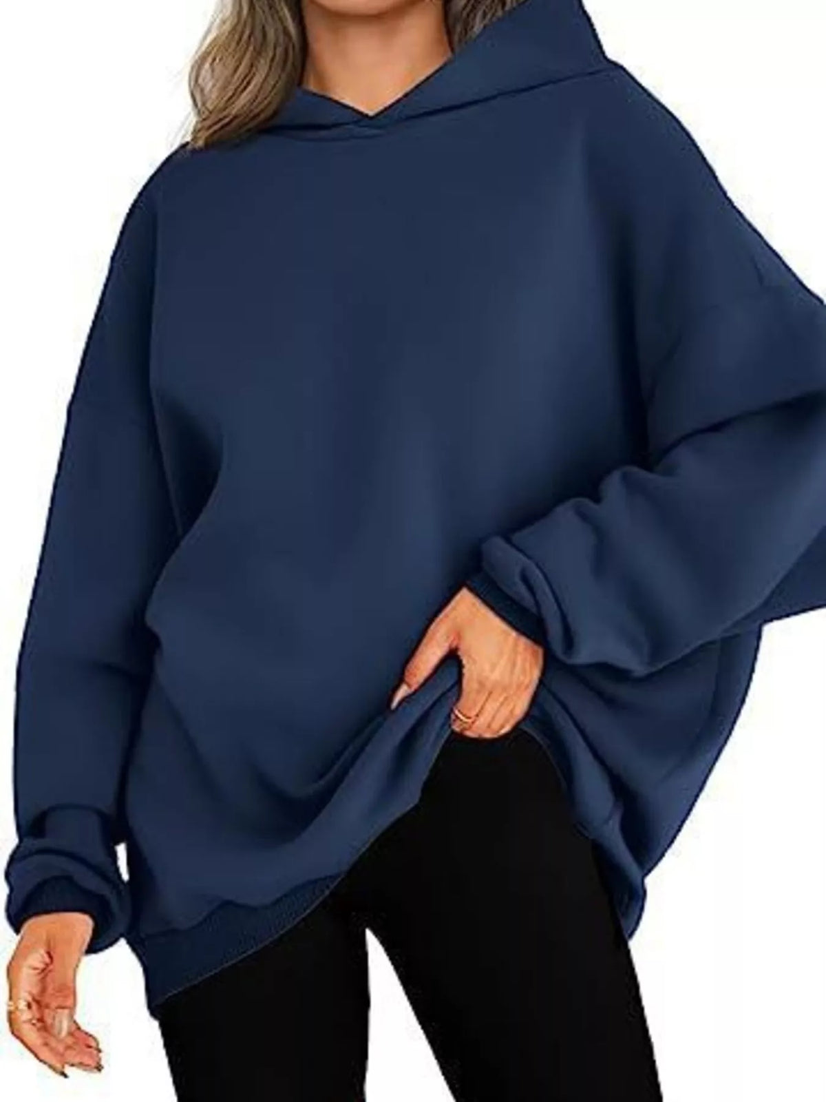 Navy blue hoodie worn by a person on a white background