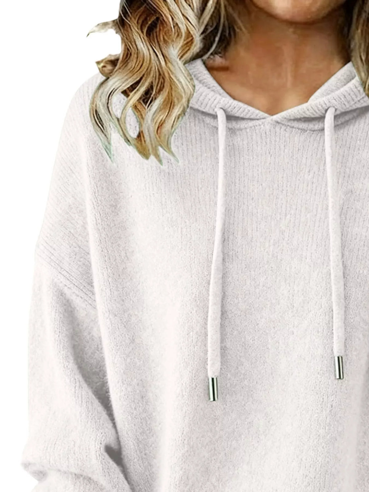 Light gray hoodie worn by a person with blonde hair on a white background