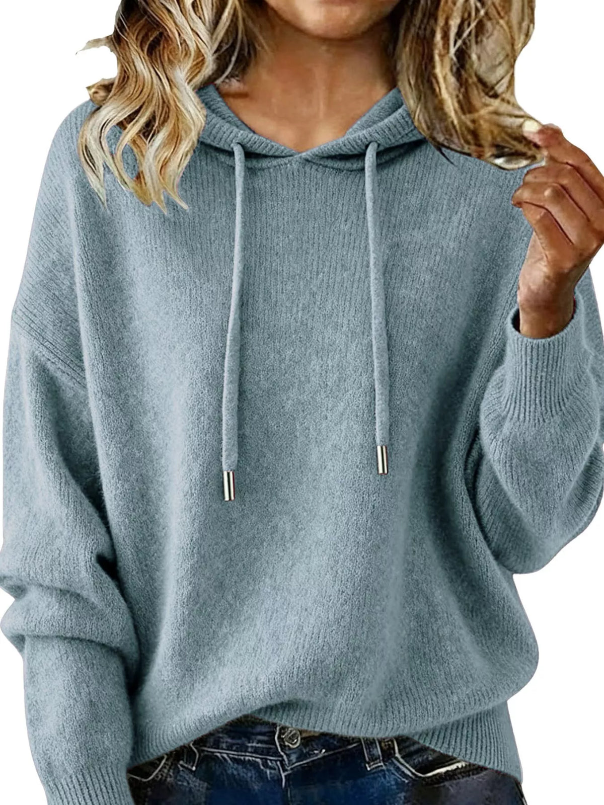 Light blue hoodie worn by a person, with a focus on the garment.