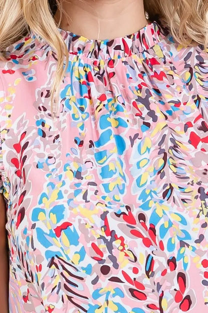 Plus‑size graphic print sleeveless top with ruffle trim and mock neck in Pink by Lime ’N’ Chili